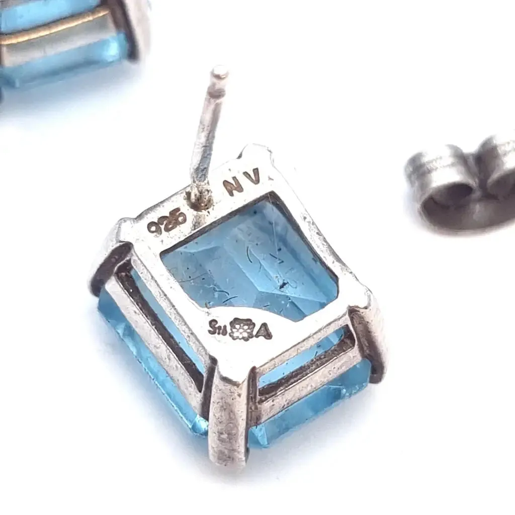 Art Deco inspired silver earrings with aquamarine simile. circa 1990.