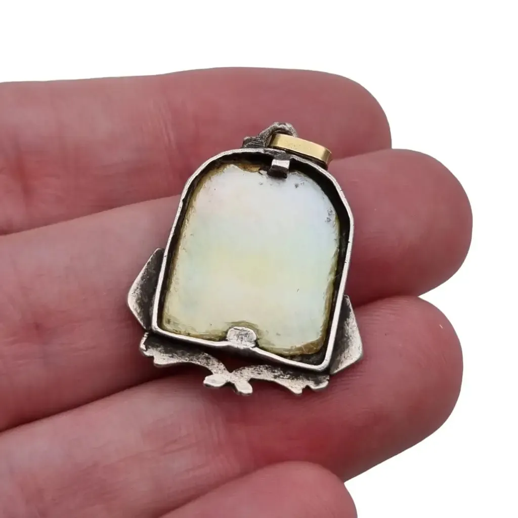 Old art deco religious medal. Mother-of-pearl cameo. Gilt silver medal.