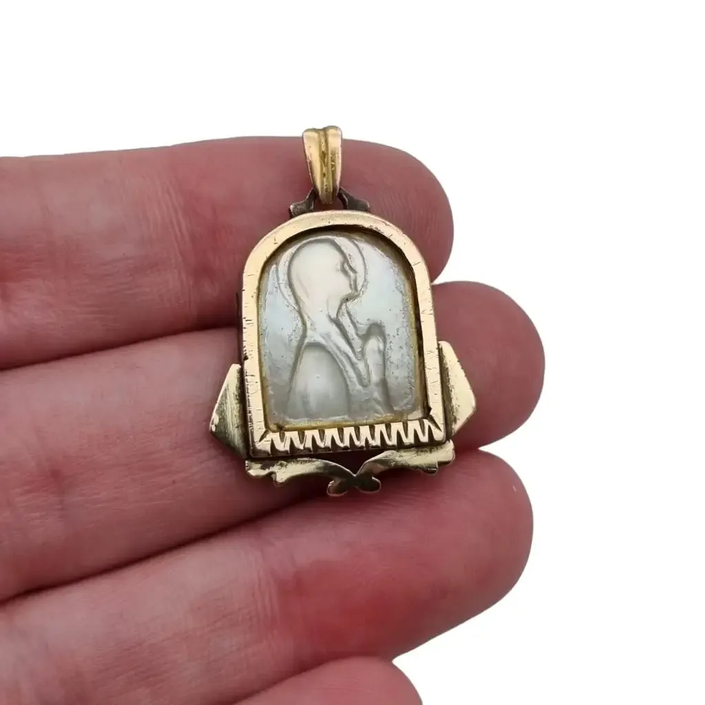 Old art deco religious medal. Mother-of-pearl cameo. Gilt silver medal.