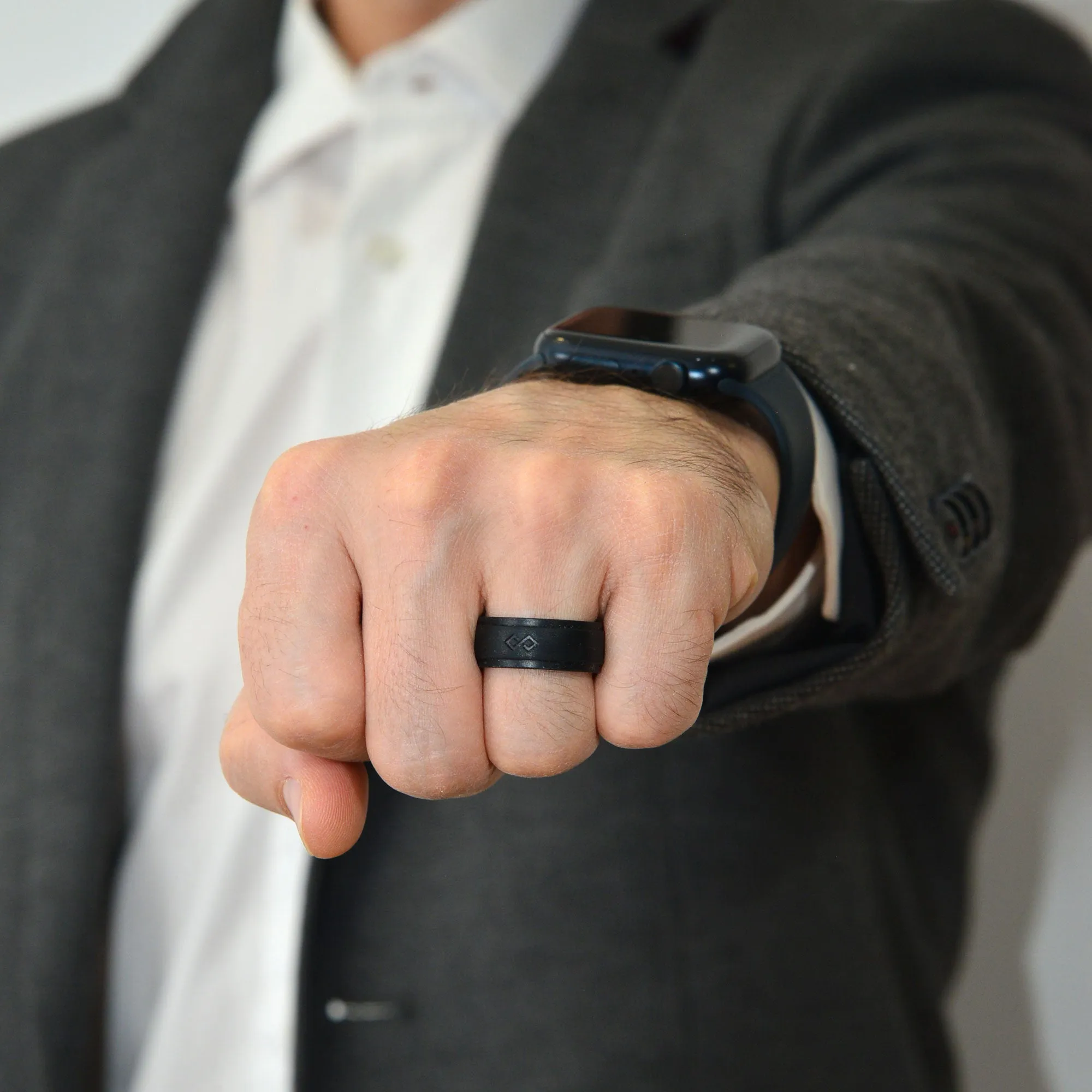 Set of Two Rings: Women's Black Emerald  & Men's Infinity Collection