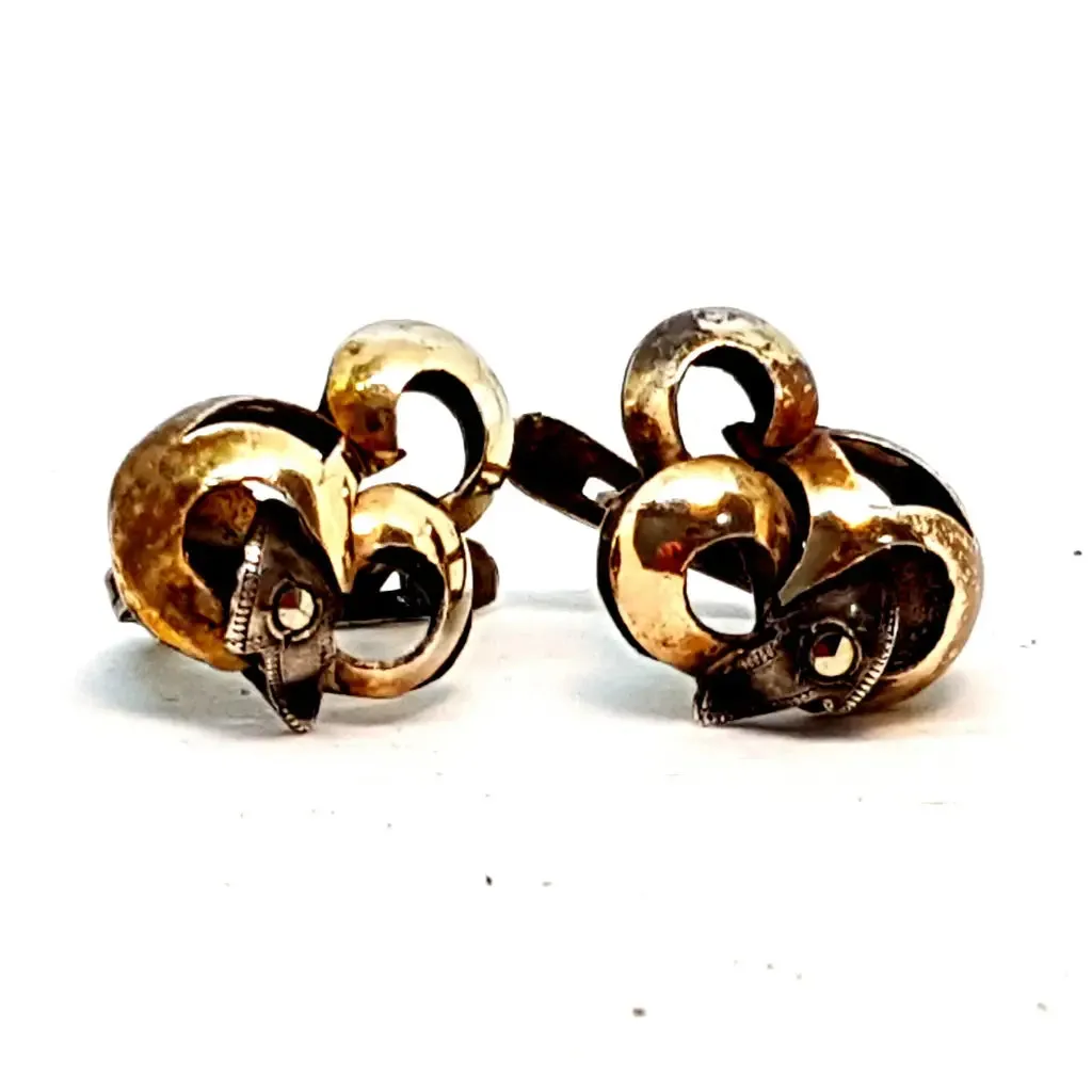 Silver and gold art deco earrings. Circa 1940. Antique and vintage jewelry.