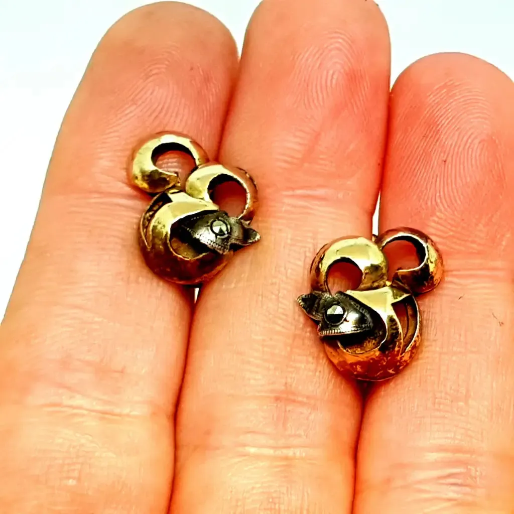 Silver and gold art deco earrings. Circa 1940. Antique and vintage jewelry.