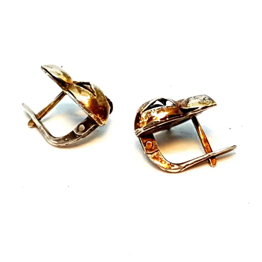 Silver and gold art deco earrings. Circa 1940. Antique and vintage jewelry.