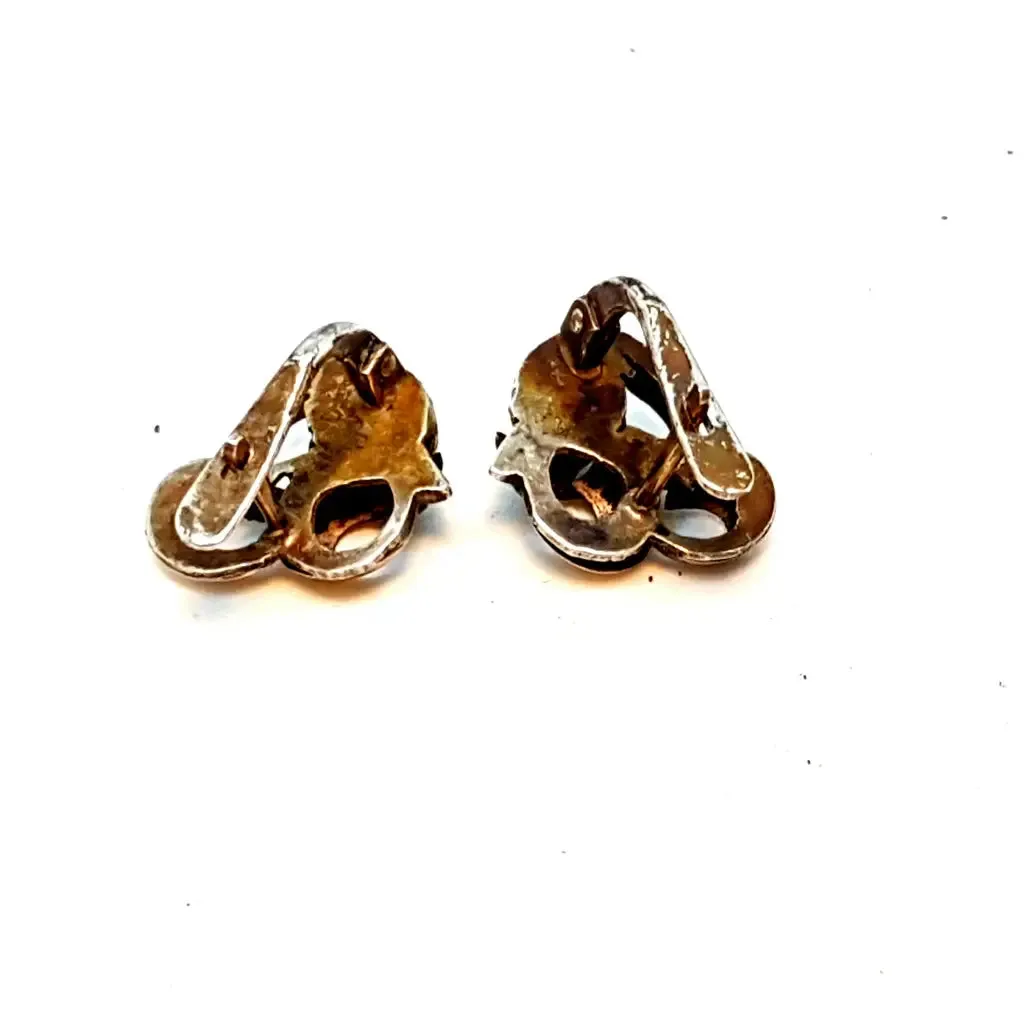Silver and gold art deco earrings. Circa 1940. Antique and vintage jewelry.