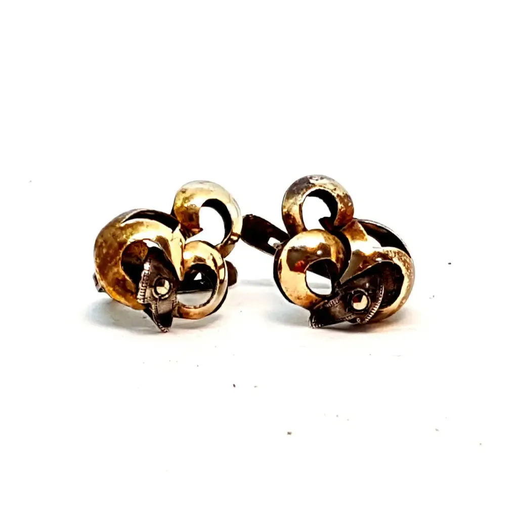 Silver and gold art deco earrings. Circa 1940. Antique and vintage jewelry.