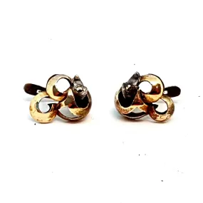 Silver and gold art deco earrings. Circa 1940. Antique and vintage jewelry.